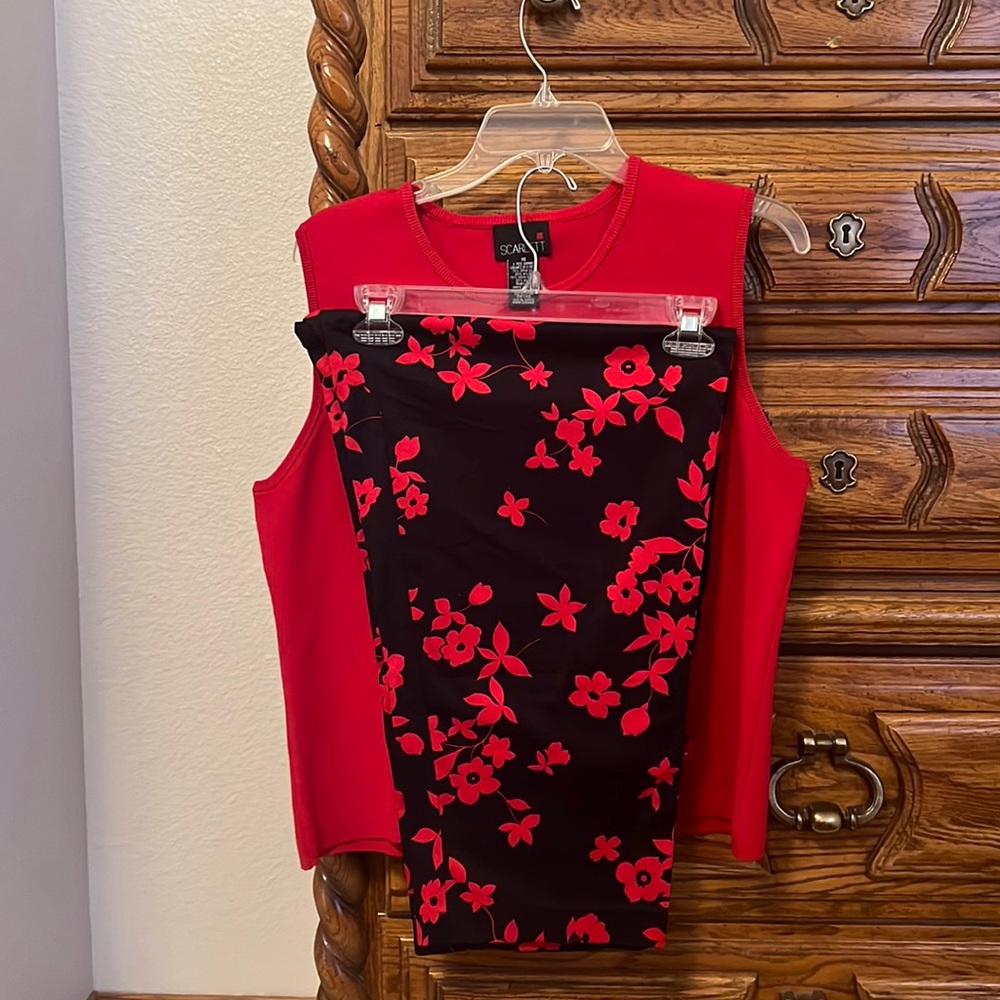 2 piece garment set, size 16. Red sweater and black pants with red flower detail